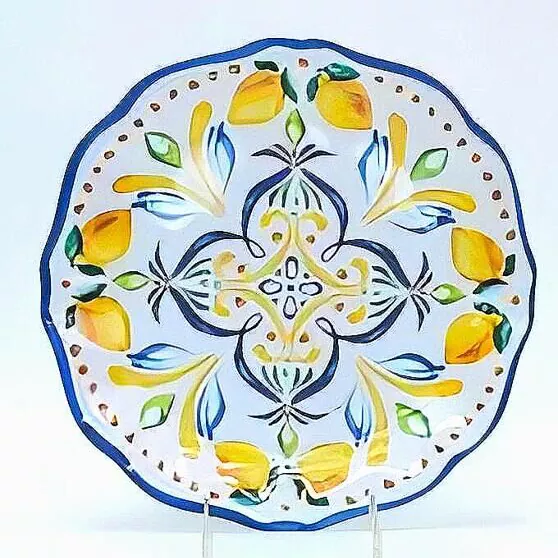 Juego de vajilla de cerámica con limón pintado a mano.