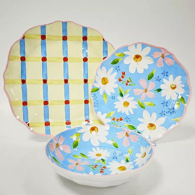 Juego de platos de jardín con margaritas pintadas